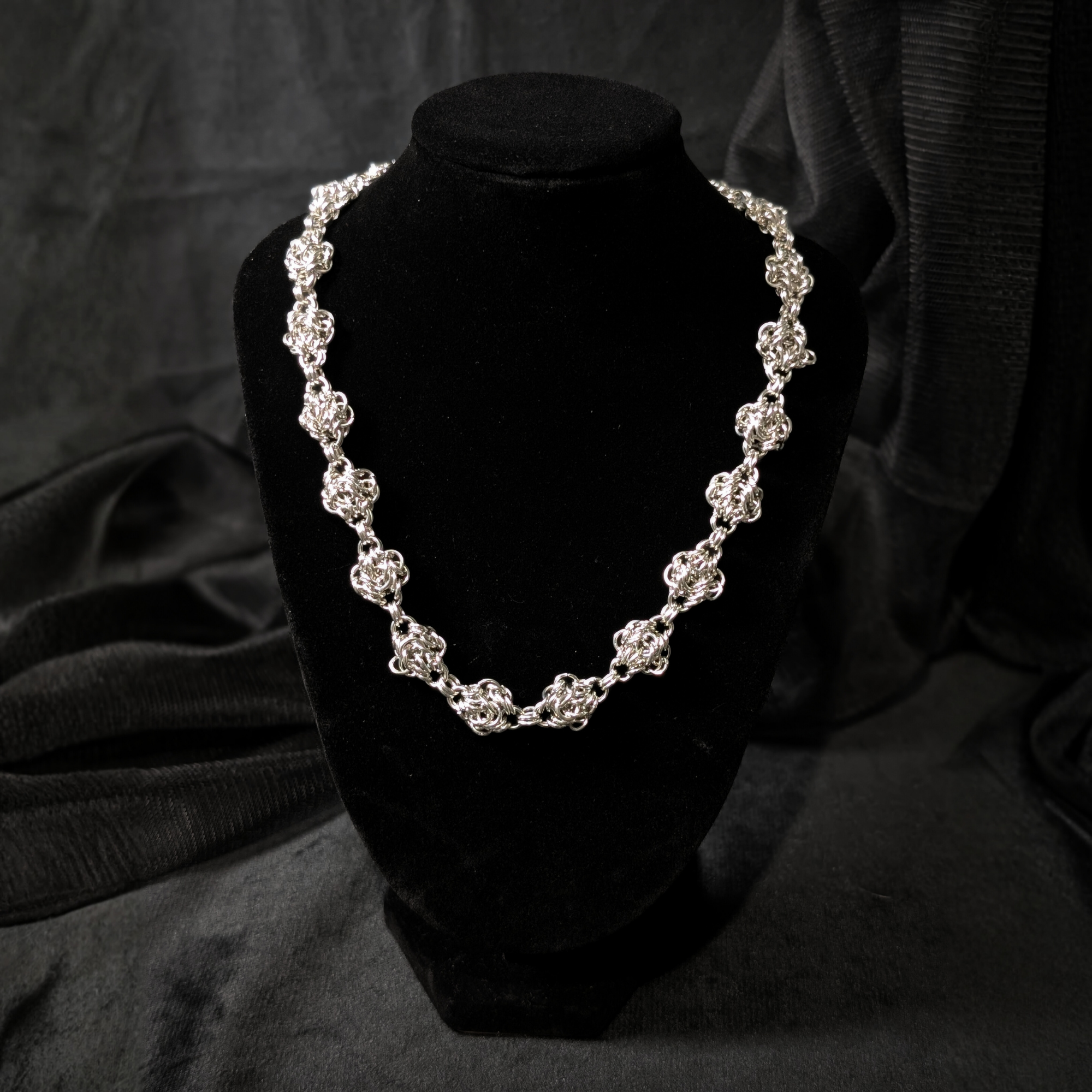 Gothic chainmail/chainmaille necklace with rosette shaped weave.